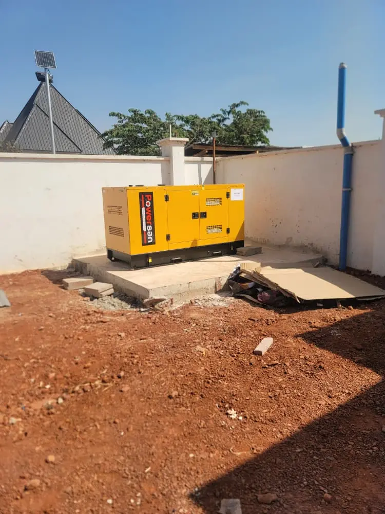 Enclosed generator installed on a prepared concrete base