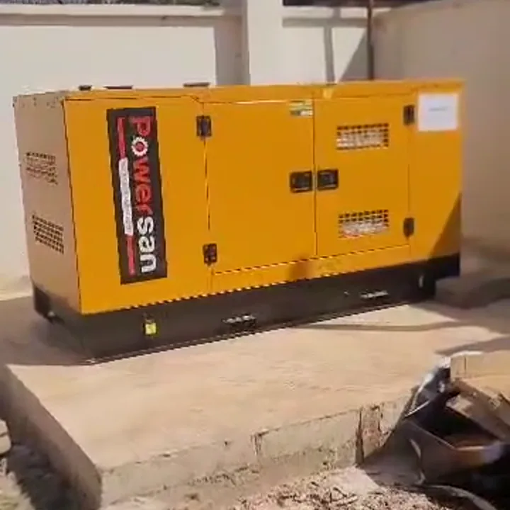 Enclosed standby generator positioned outdoors on a raised equipment base